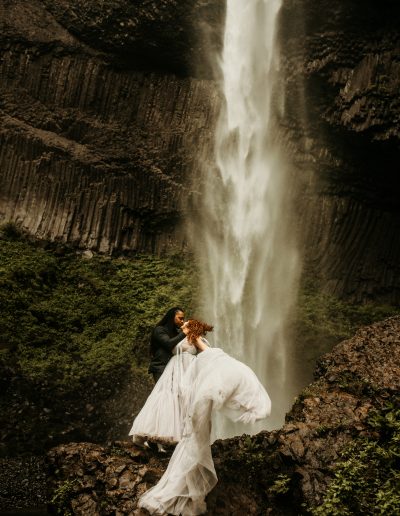 epic wedding dress at a waterfall in Oregon